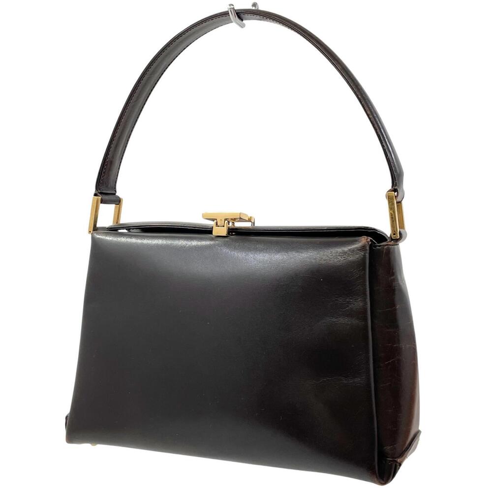 Gucci black leather top handle bag trapezoid silhouette